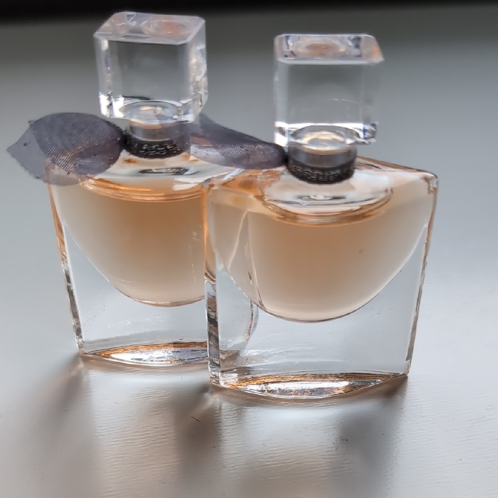 Elegant Perfume Bottles with Black Ribbon